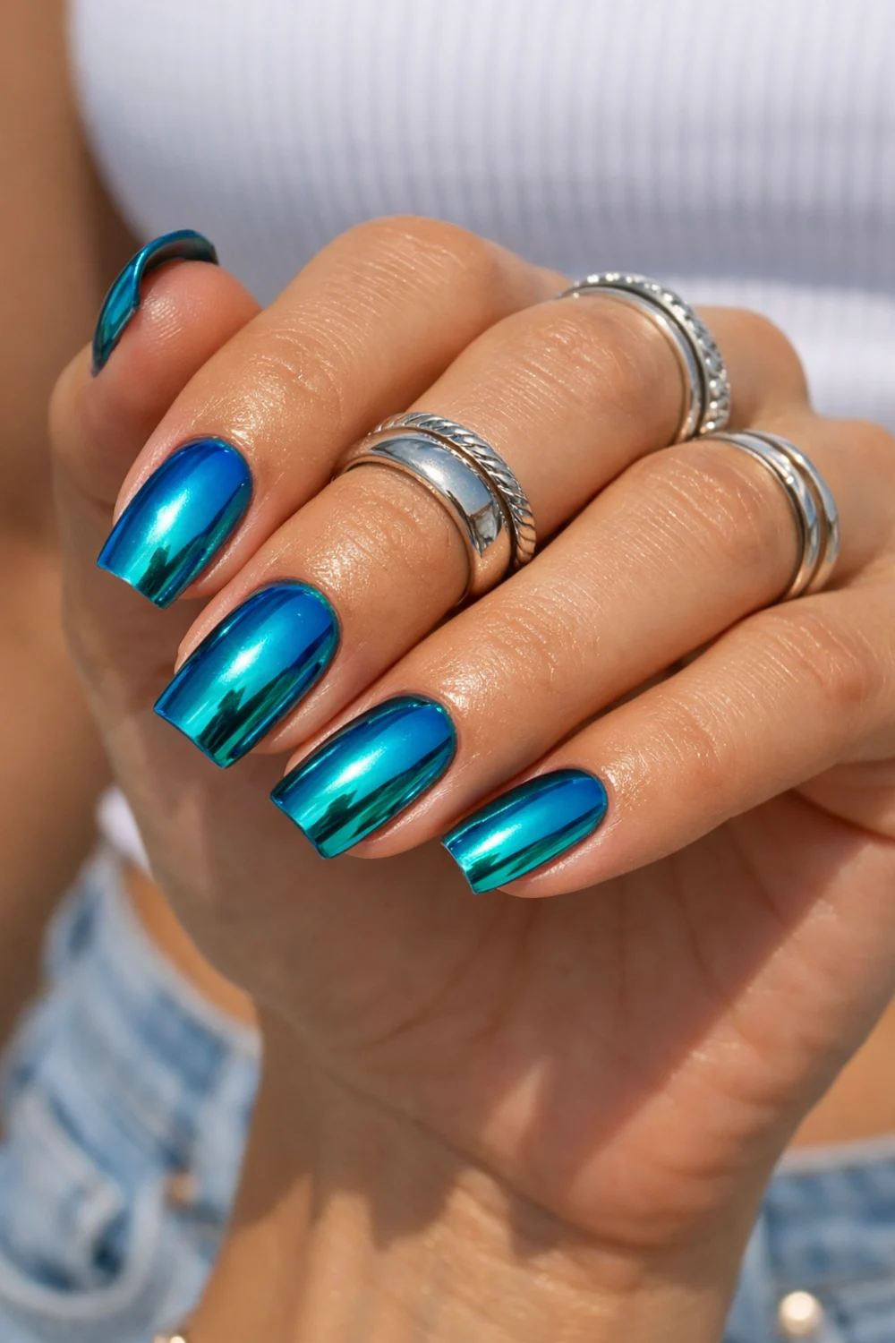Teal Blue Chrome Nails
