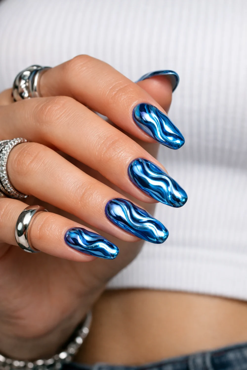 Wavy Blue Chrome Nails
